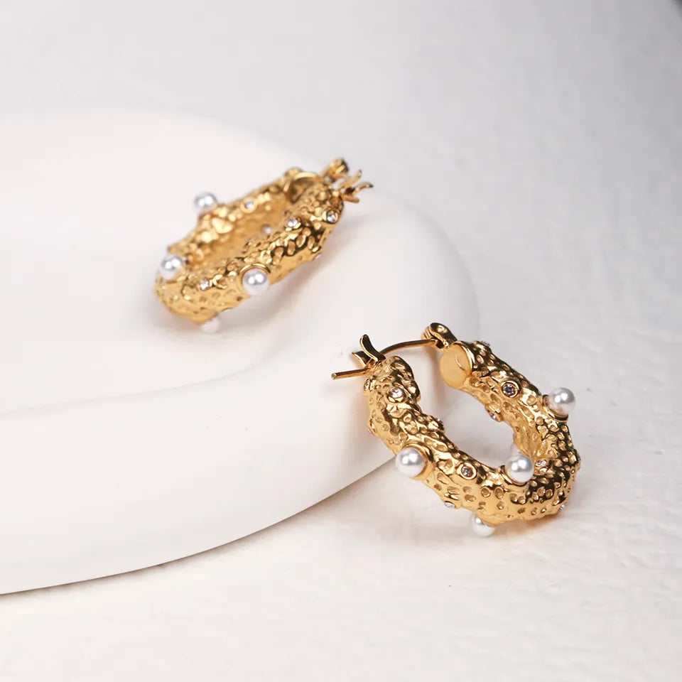 Stainless steel hoop earrings with 18k gold plating Fragility