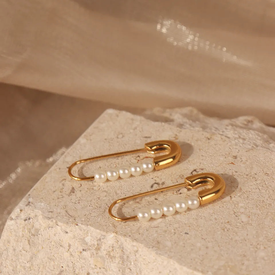 Stainless steel earrings with 18k gold plating Proximity